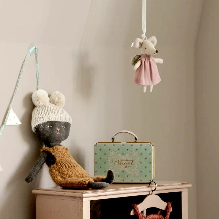 Angel mouse in suitcase