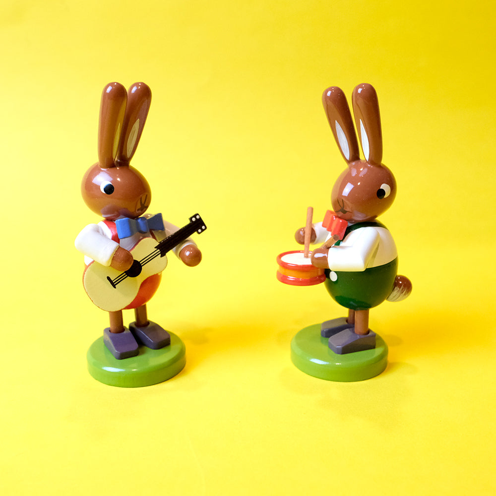 Wooden Bunny musician with Guitar