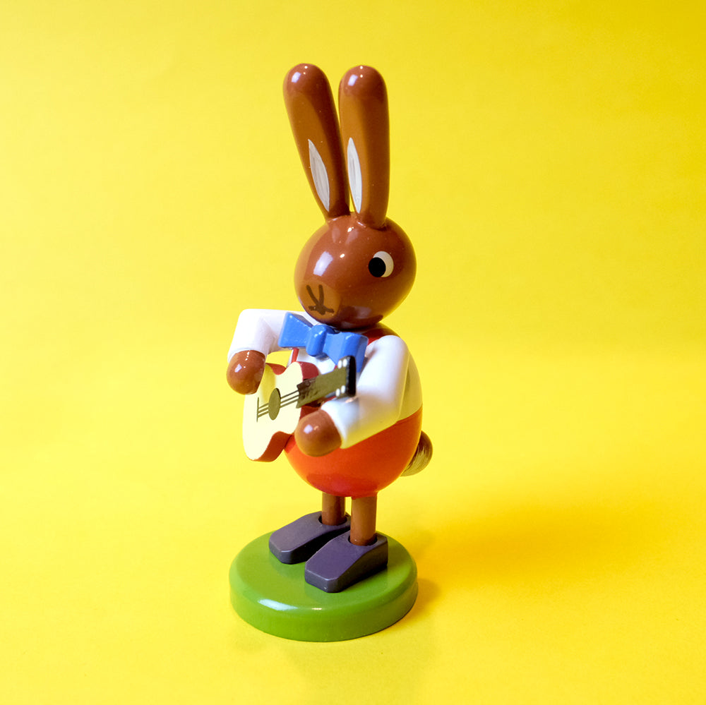 Wooden Bunny musician with Guitar
